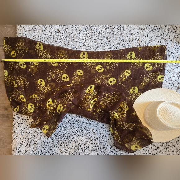 Sheer scarf. Brown with yellow skull print. - Picture 3 of 5